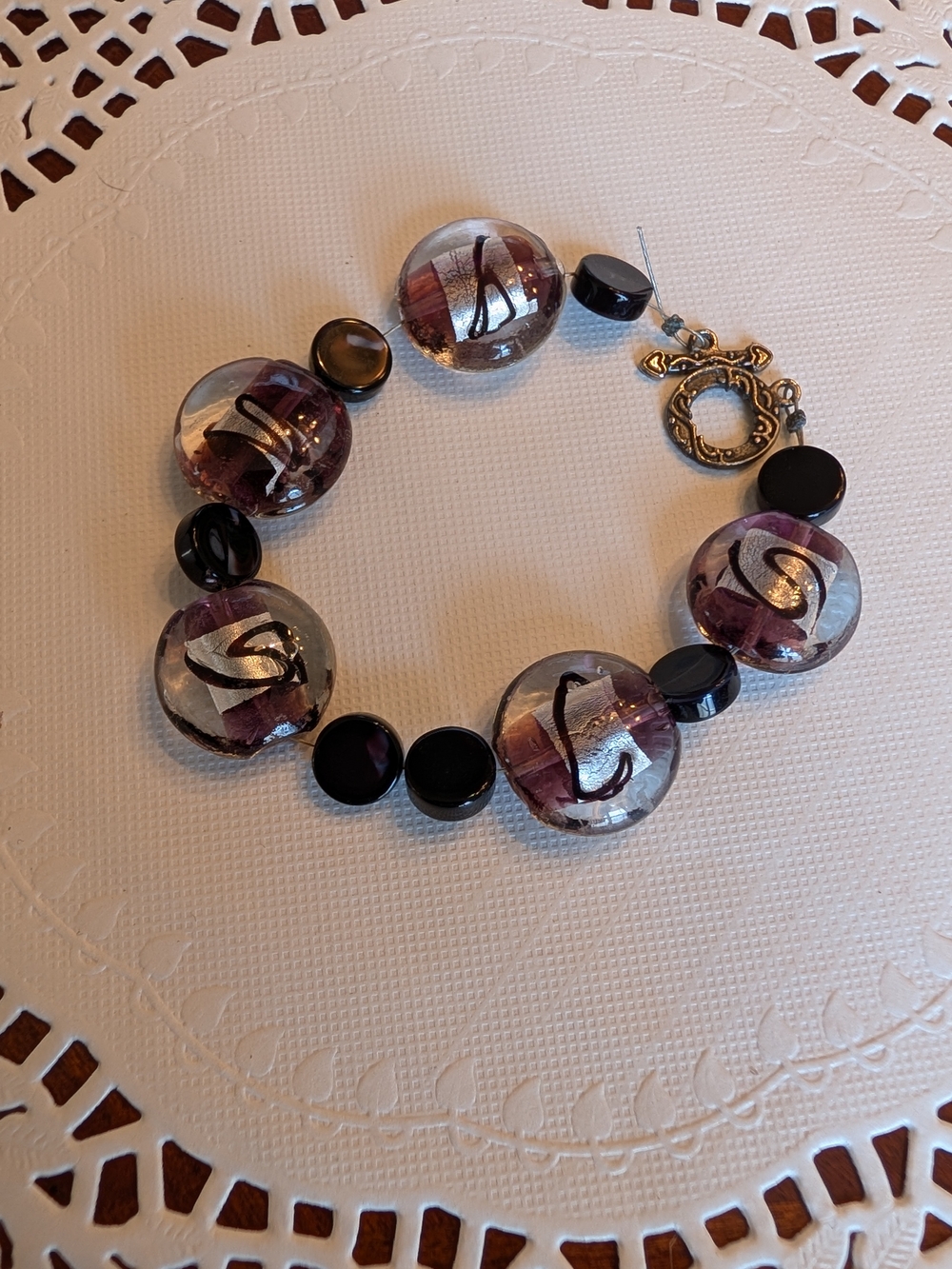 Handmade Purple Glass Disc Bracelet with Black Accents
